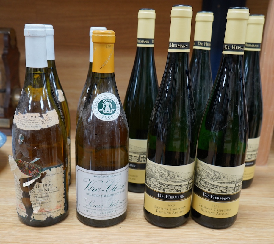 Nine bottles of white wine including; Five bottles of Dr. Hermann 2007 Erdener Treppchen Riesling Auslese, a bottle of Vire-Clesse Louis Latour, and three bottles of 1996 wine (labels badly damaged). Condition - poor to